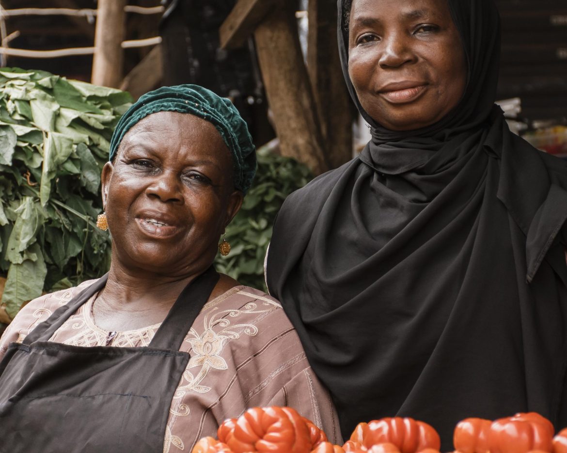 medium-shot-women-posing-market